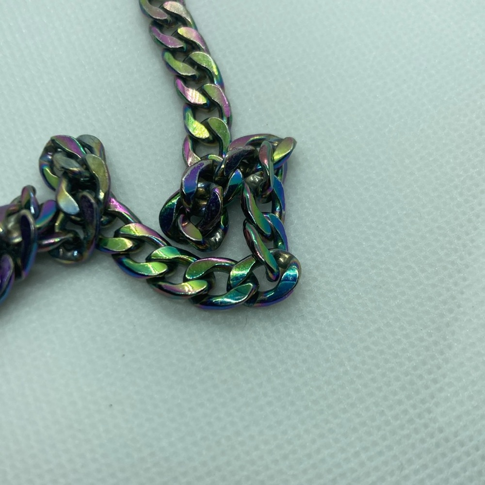 Different colors in necklace Has hook & is 20” long opened up Unisex